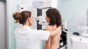 What Role Does Genetic Testing Play Alongside Breast Screening?