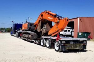 How Are Risks Overcome in Heavy Equipment Backhoe Transport