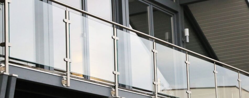 Why Modern Renovations Feature Custom Glass Railings and Handrails